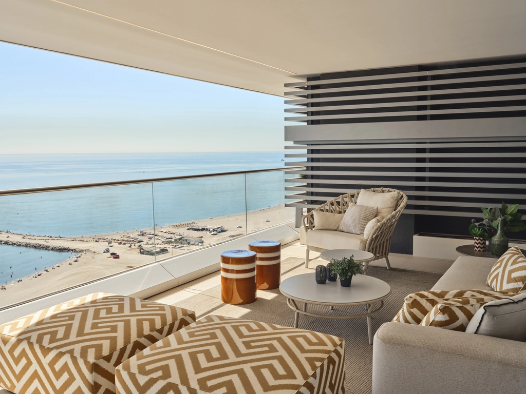 A beautifully appointed terrace, perfect for relaxing or dining while enjoying the sea breeze and stunning coastal views.