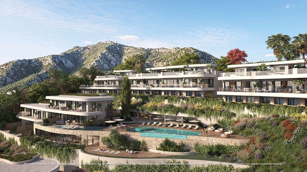 A broad view of the development, showcasing how its innovative design harmonizes with the natural hillside landscape.