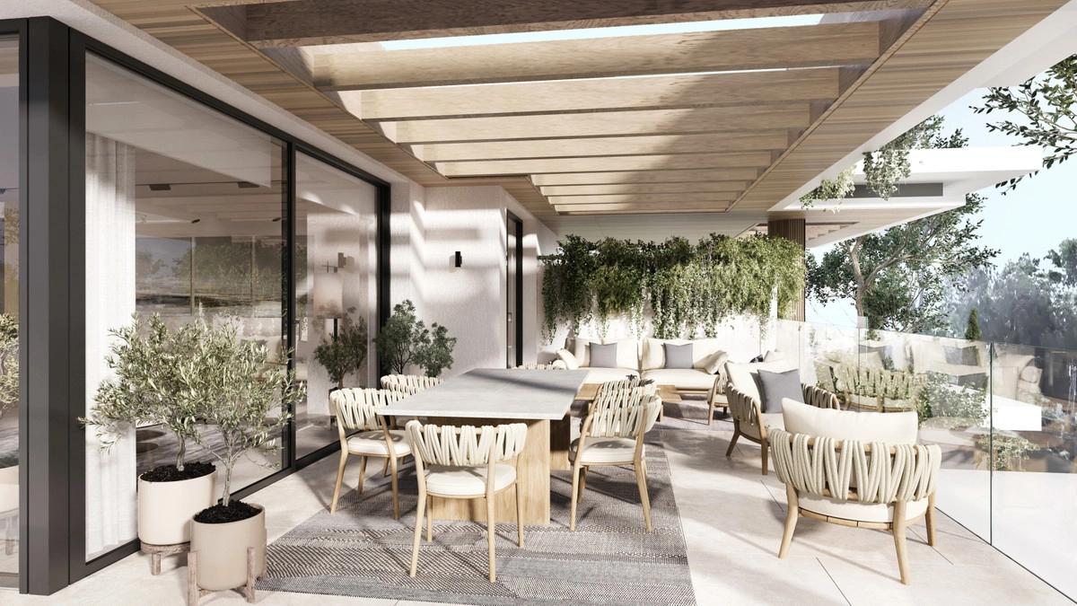 Expansive covered terraces seamlessly extend living spaces for year-round outdoor enjoyment.