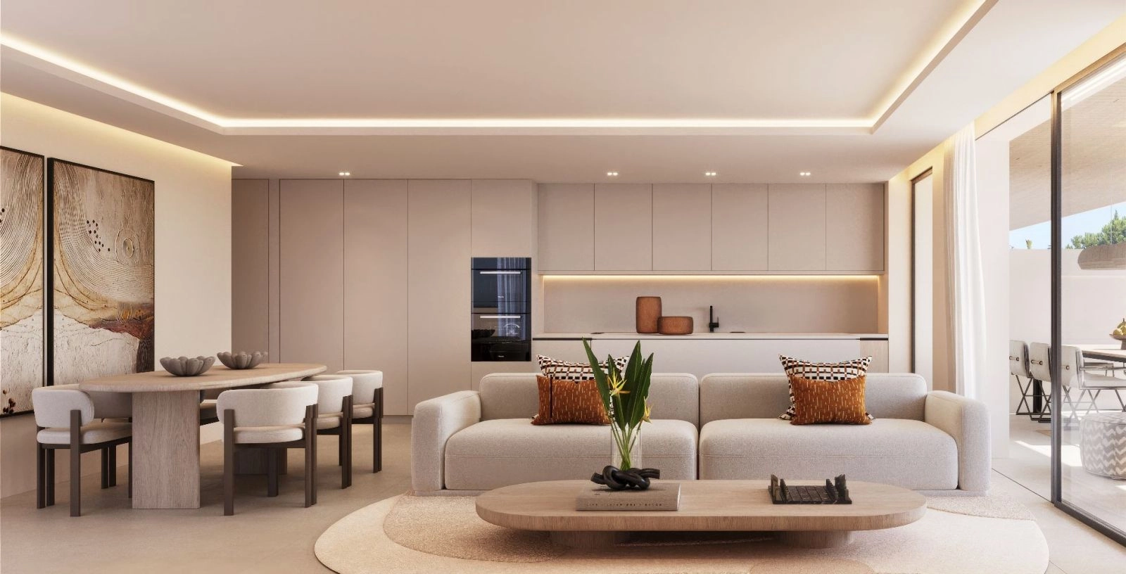 The bright, open-plan living area connects effortlessly to the kitchen and terrace, creating a modern and social space.