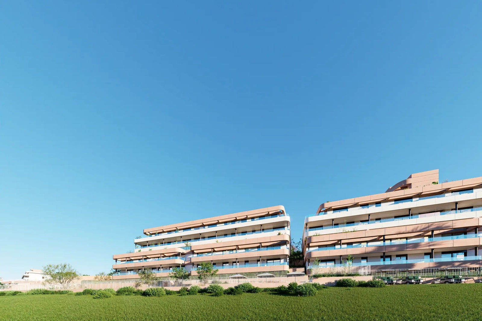An expansive view of the residential complex, perfectly integrated into the lush green fairways of Estepona Golf.