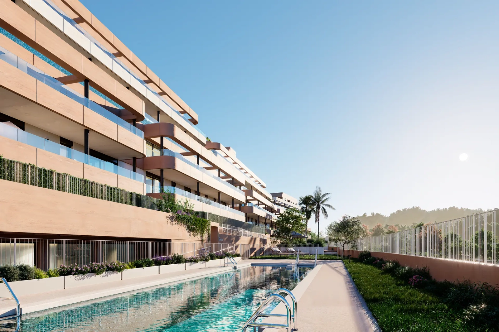 The main swimming pool is set within landscaped gardens, offering a tranquil oasis for residents to enjoy.