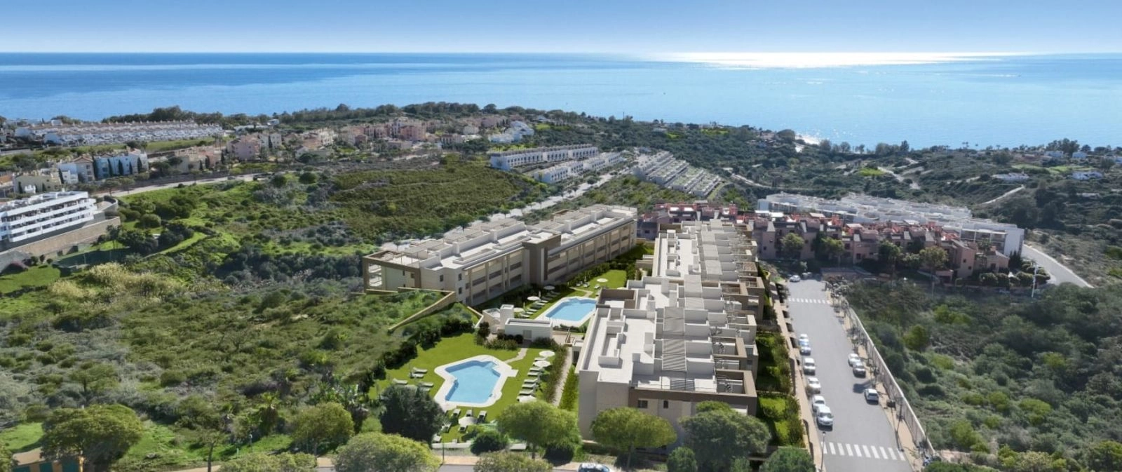 An aerial perspective showcasing the development's privileged position overlooking the sea on the Costa del Sol.