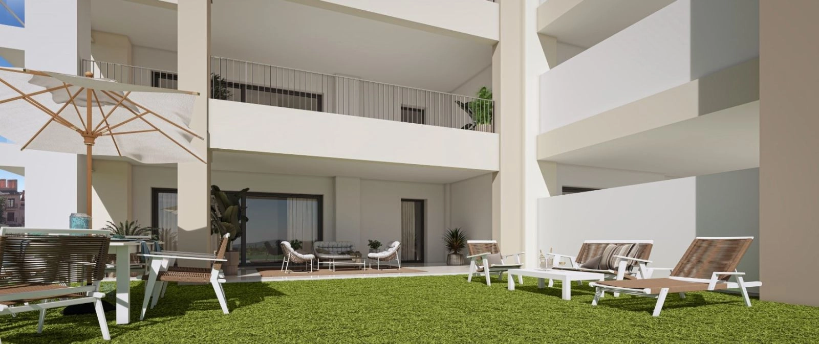 Ground-floor apartments benefit from generous private gardens, seamlessly extending the living space outdoors.