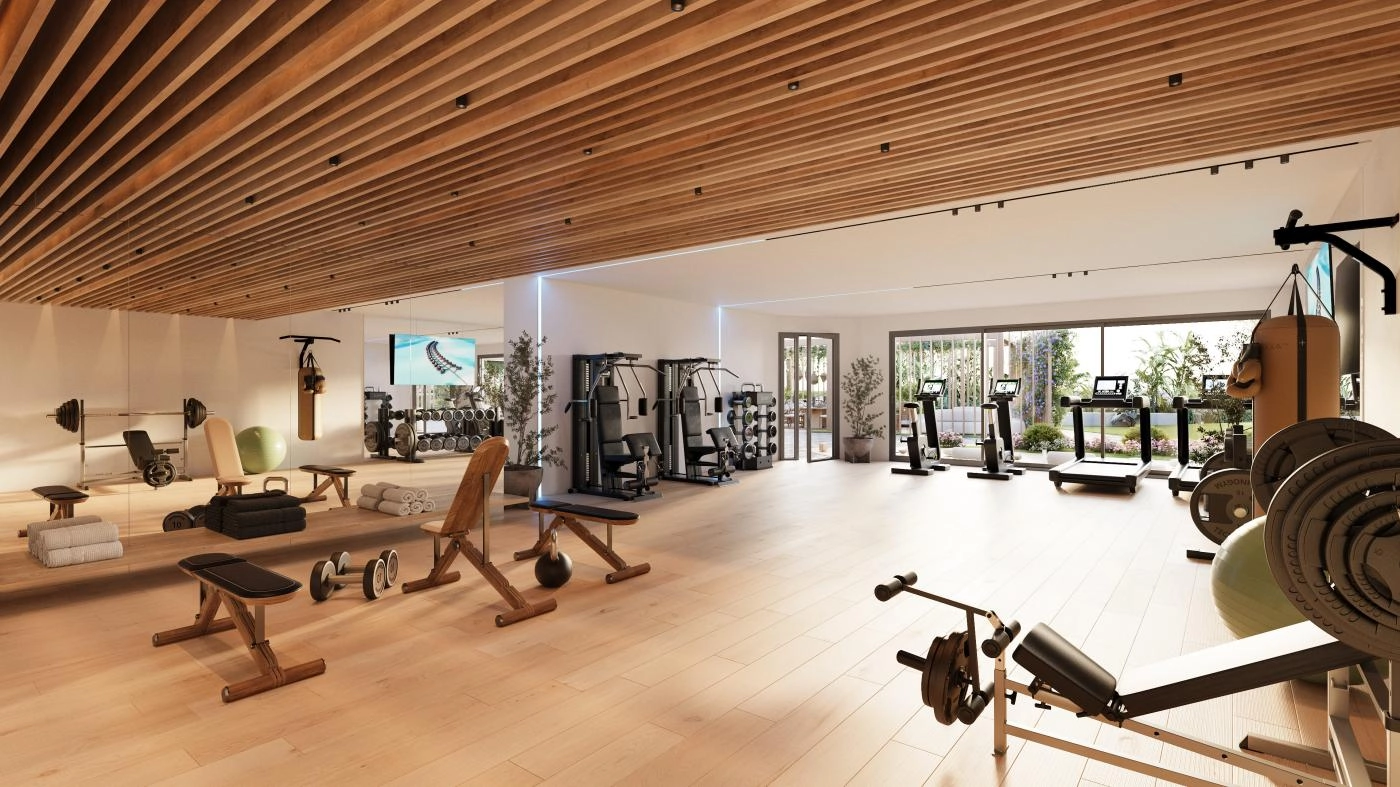 A state-of-the-art, fully equipped gymnasium with natural light, designed to support a healthy and active lifestyle.