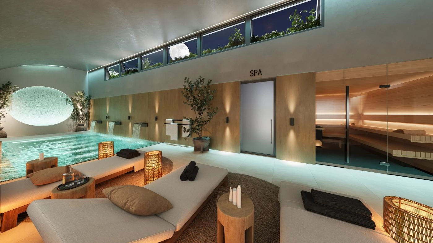 The luxurious indoor spa, complete with a heated pool and sauna, offering year-round relaxation and well-being.