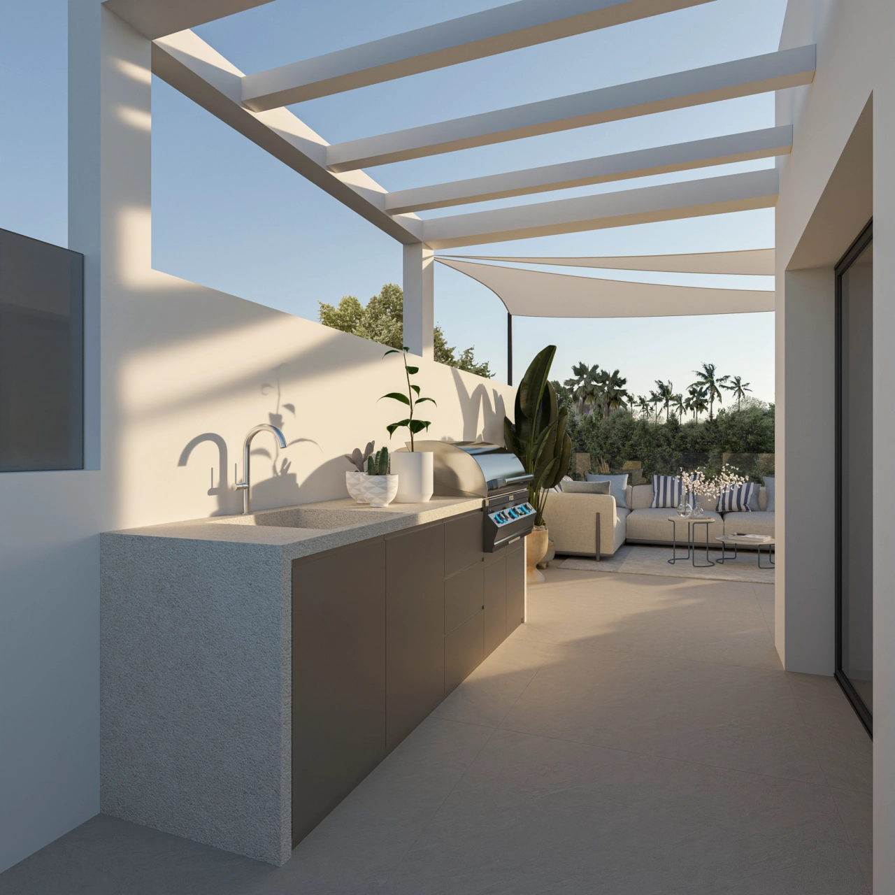 The terrace includes a high-quality outdoor kitchen, perfect for alfresco dining.