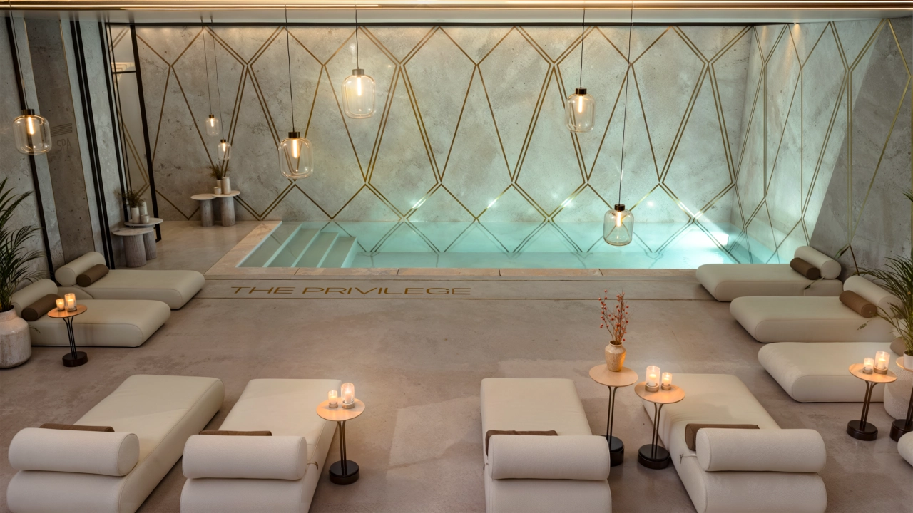 The exclusive residents' spa provides a tranquil environment to unwind, featuring a heated pool and relaxation areas.