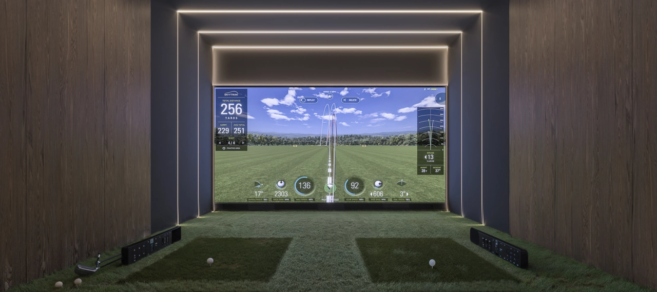 Perfect your swing year-round in the exclusive golf simulator, a unique residents' amenity.