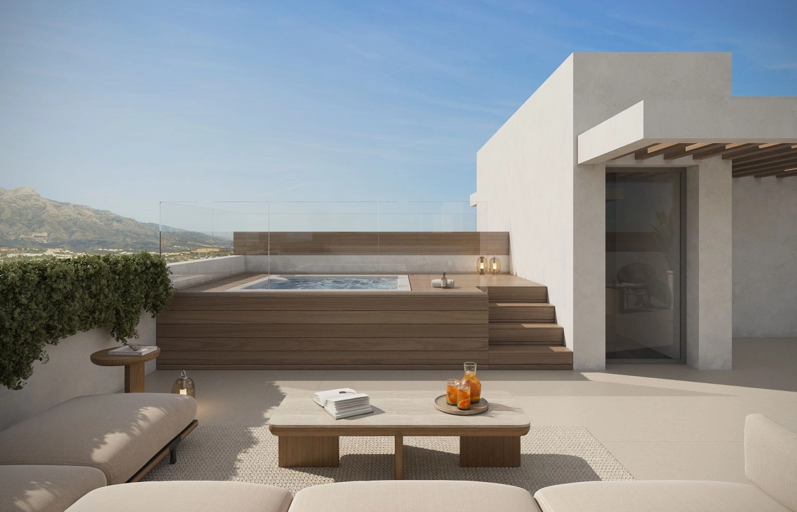 Your private rooftop solarium, an ideal space for relaxing in the jacuzzi with views of the mountains.