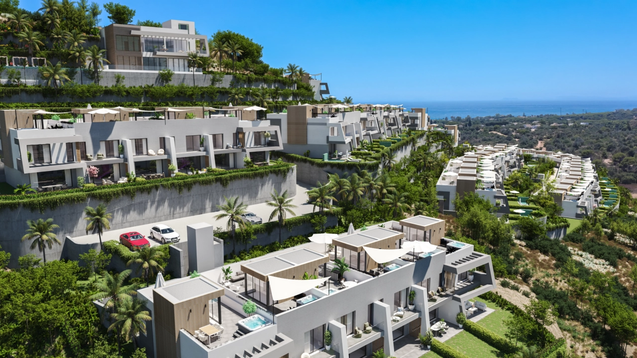 A view of the development's modern architecture, designed to integrate with the hillside landscape of Marbella.