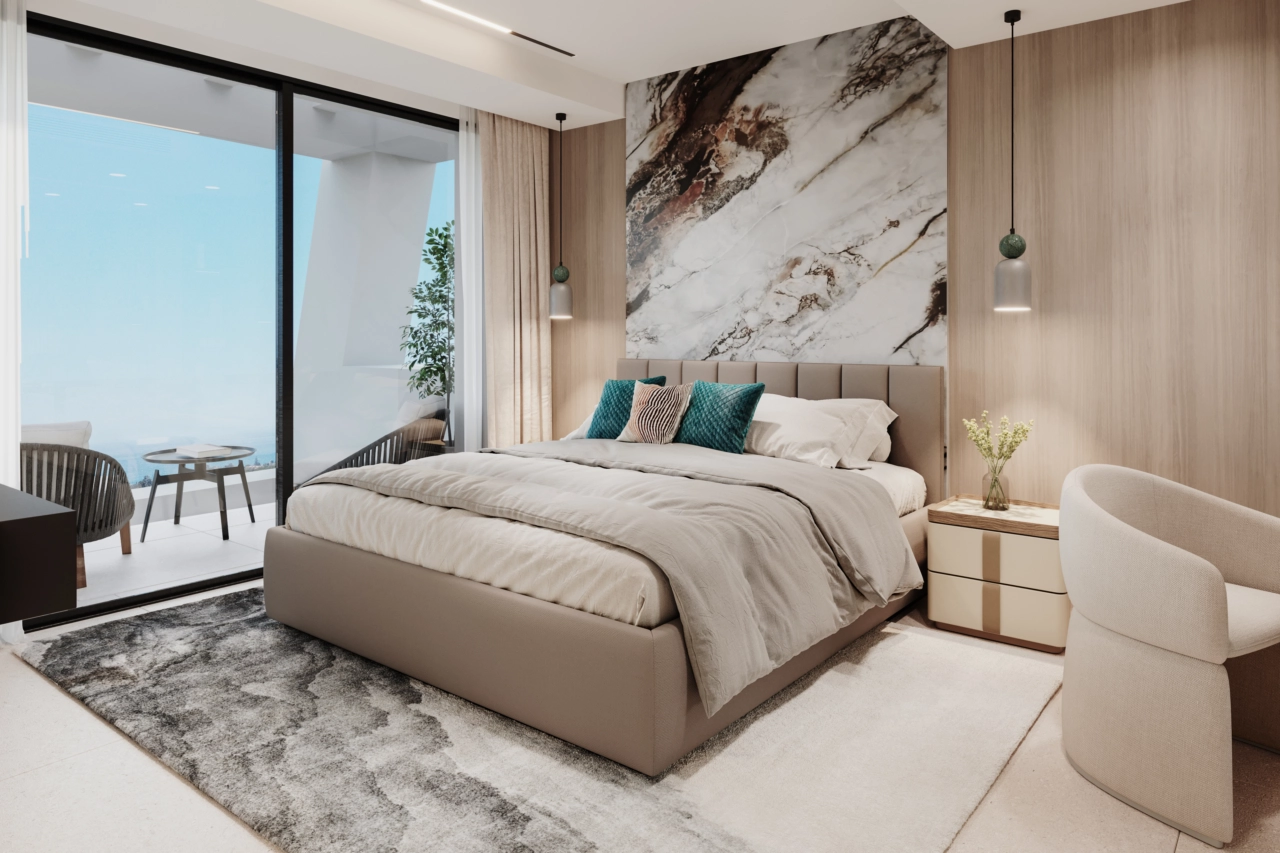 The principal bedroom is a peaceful retreat, featuring elegant design and direct access to a private terrace.