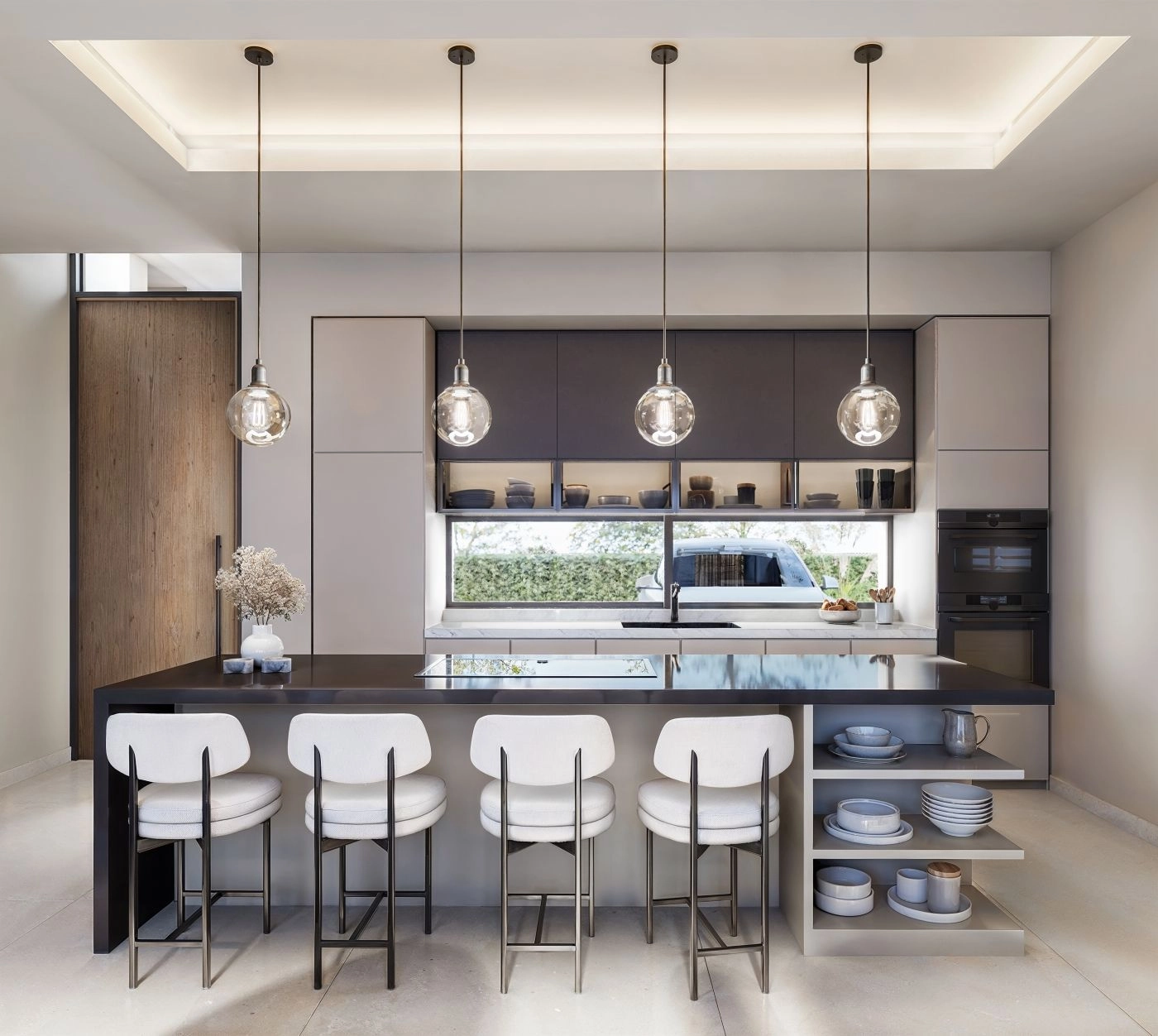 A state-of-the-art kitchen with a central island, perfect for cooking and socialising with family and friends.