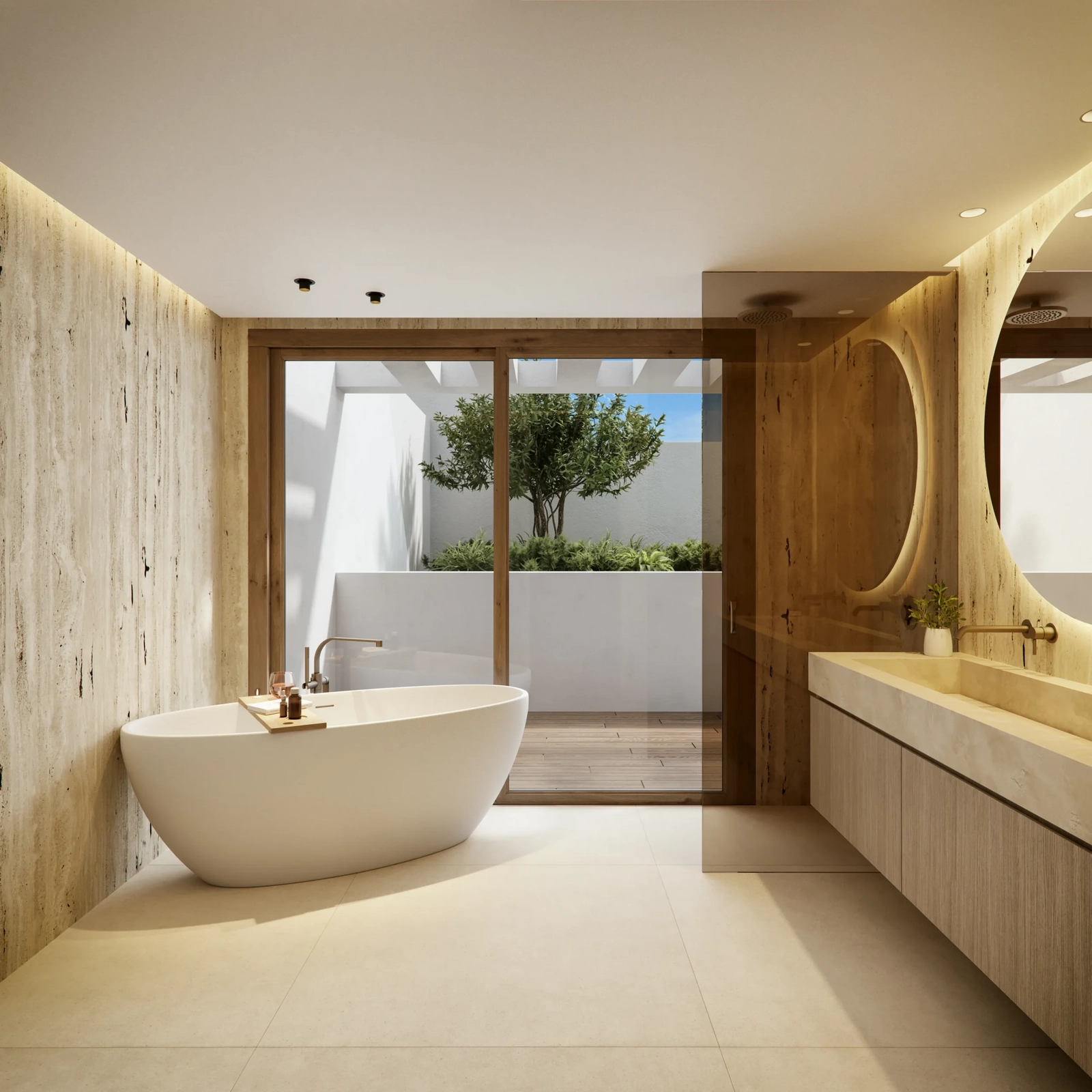A spa-inspired bathroom with a freestanding bathtub and views to a private patio offers a luxurious escape.