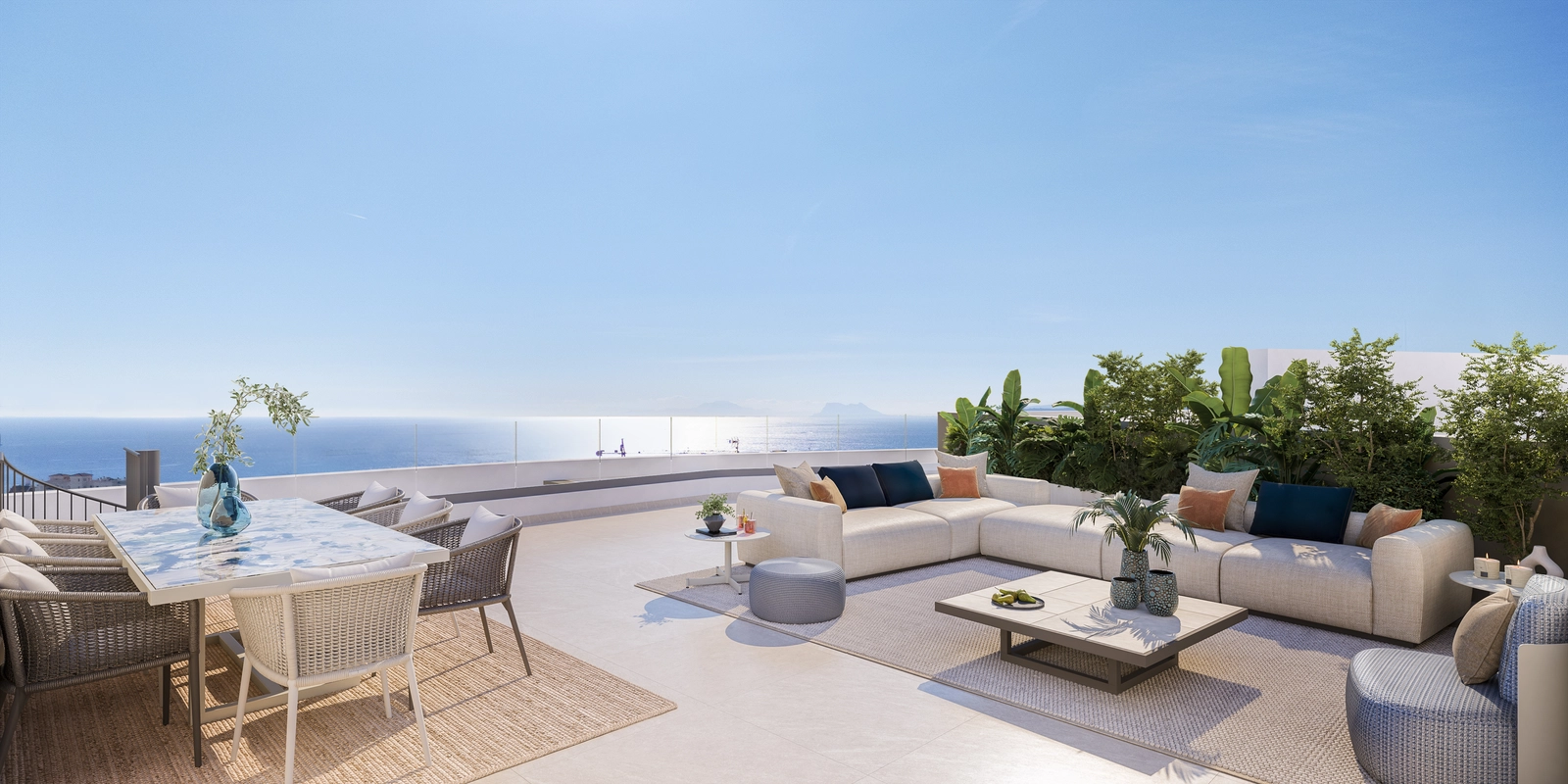 The expansive terrace offers a perfect setting for dining and relaxing, with breathtaking views of the Mediterranean Sea and Gibraltar.