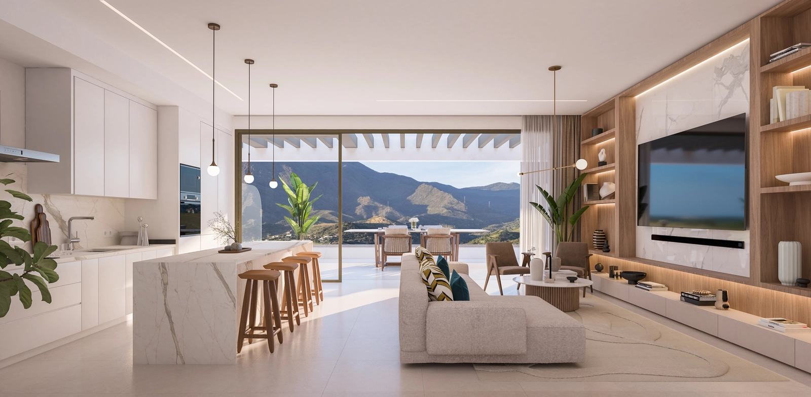 A view from the modern kitchen and living room out to the terrace, highlighting the open design and beautiful mountain scenery.