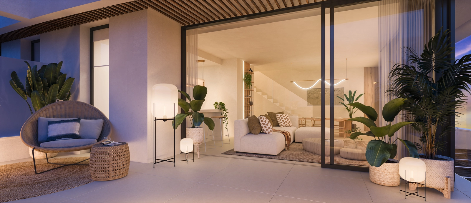 An elegant living space that opens onto a spacious terrace for seamless indoor-outdoor living.