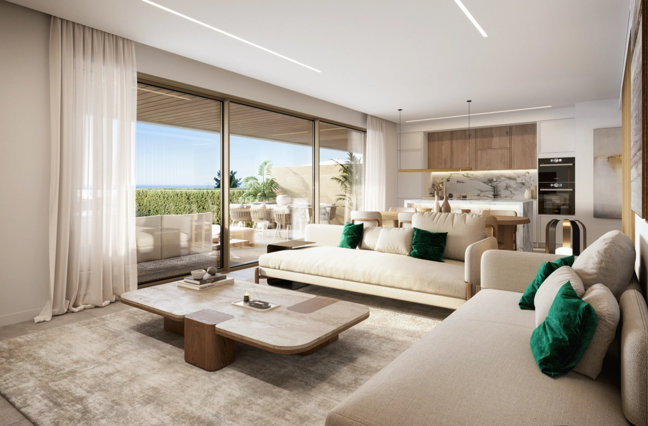A bright and spacious living area that opens seamlessly onto an elegant terrace.