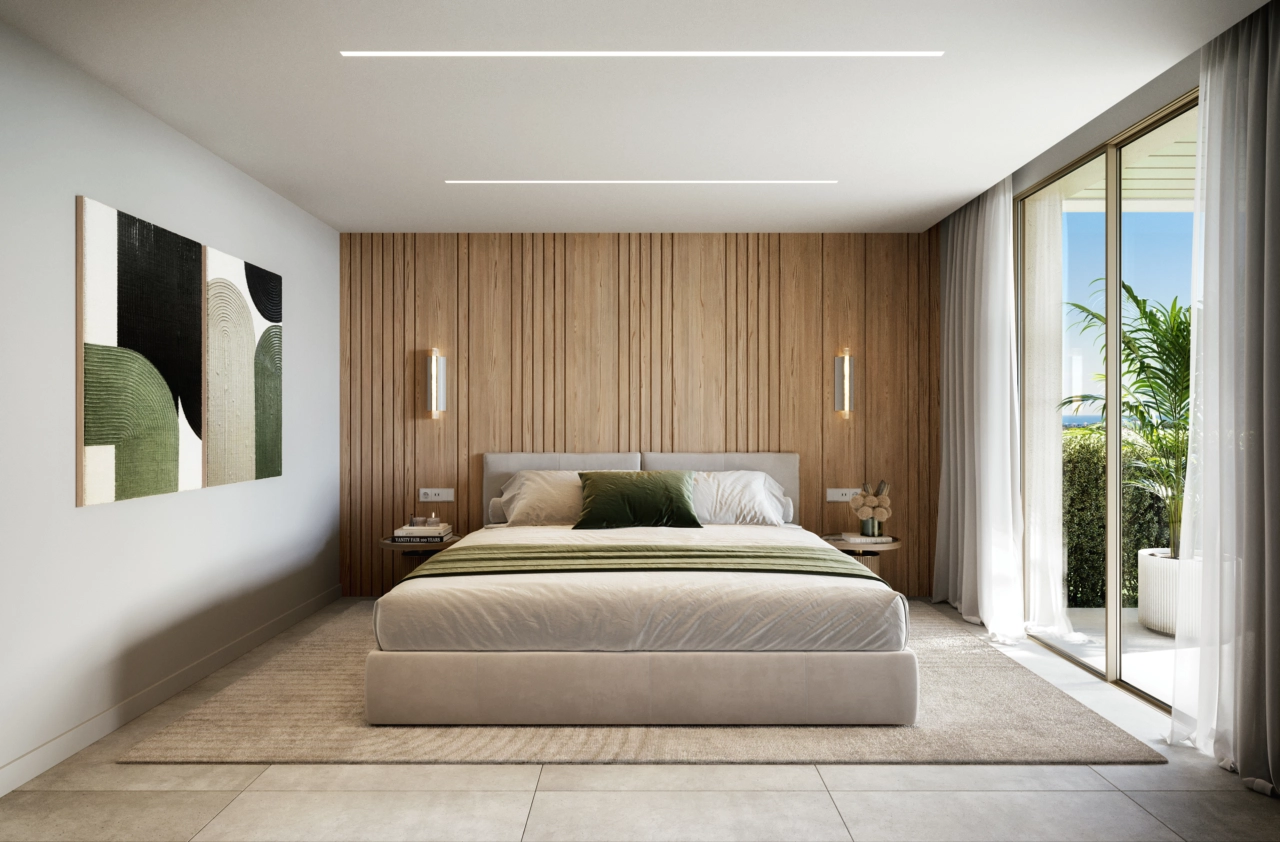 The serene master bedroom provides direct access to a private outdoor space.