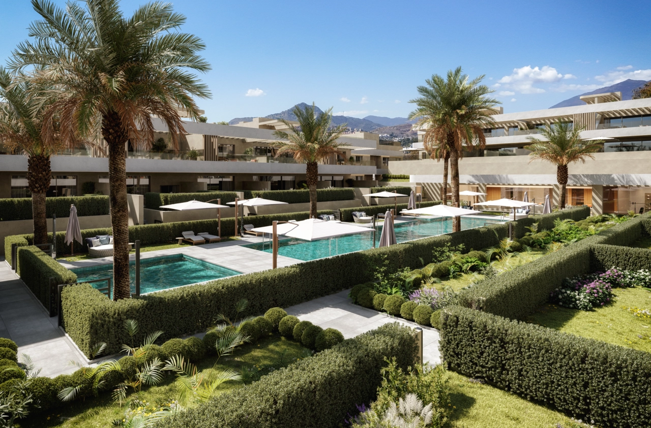 The community pool area is a serene oasis surrounded by palm trees and lush gardens.