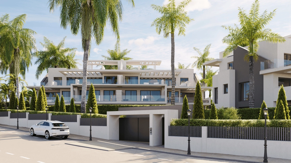 The development's elegant contemporary architecture is complemented by lush, manicured gardens and pathways.