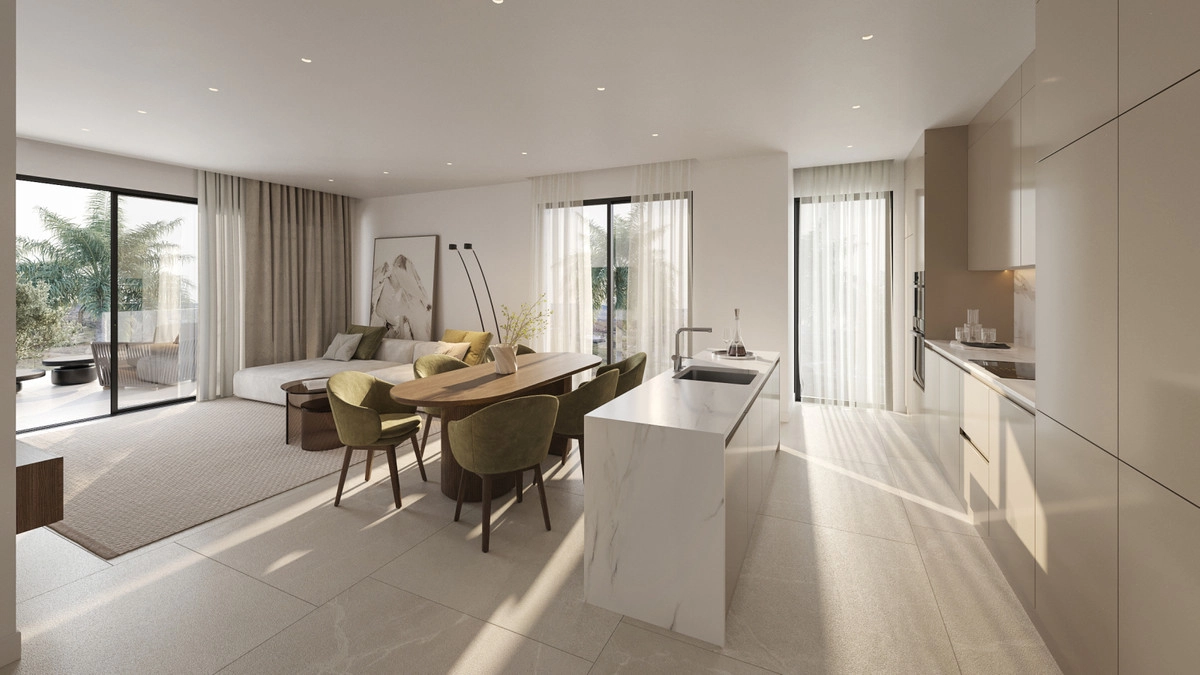 The modern kitchen with its sleek island is central to the home, ideal for social gatherings.