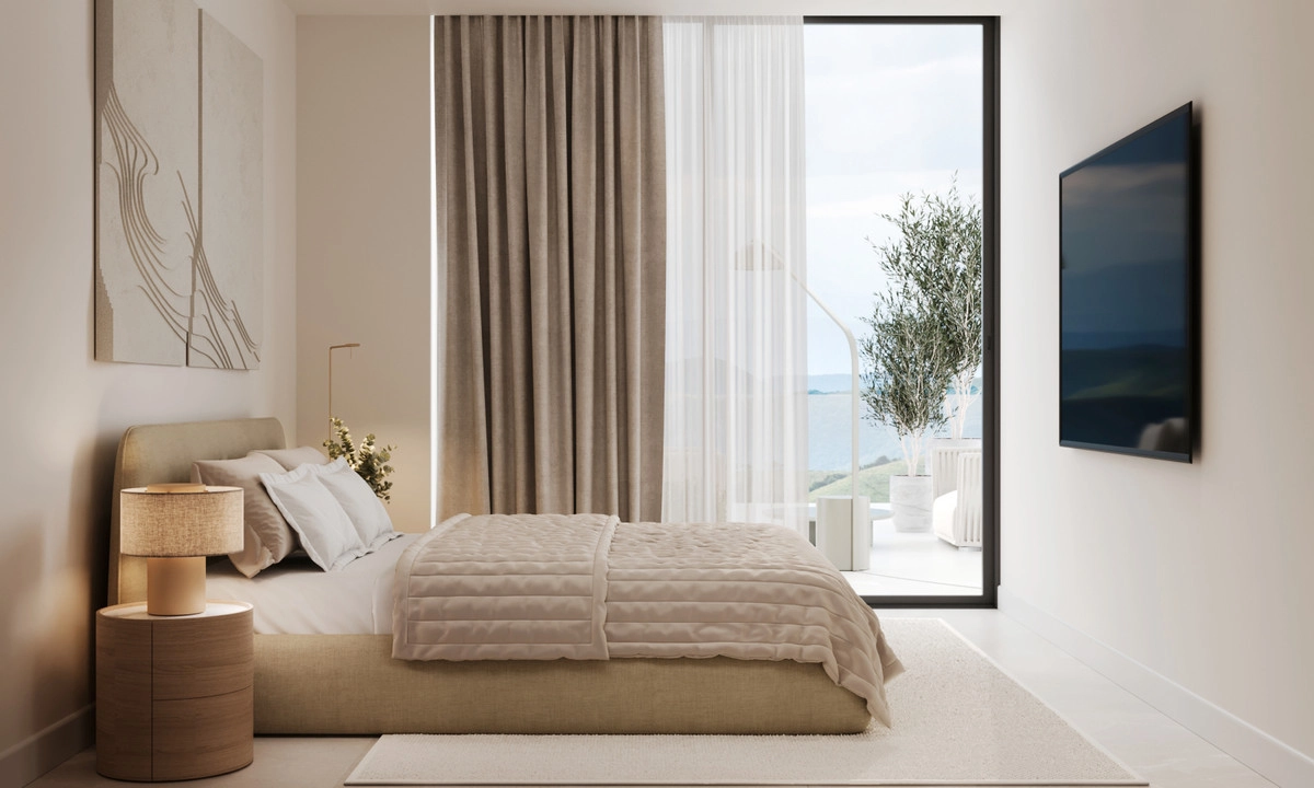 Wake up to beautiful views from this tranquil bedroom, featuring large windows and direct terrace access.