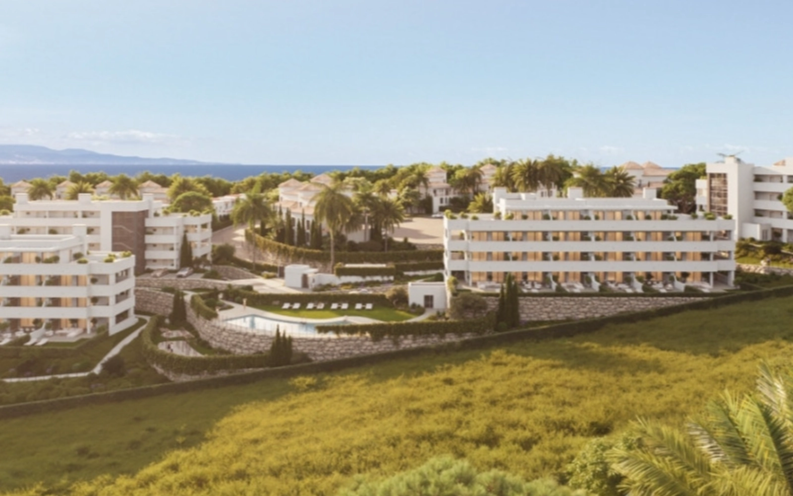 The modern architecture blends perfectly with the natural landscape and the Mediterranean Sea.