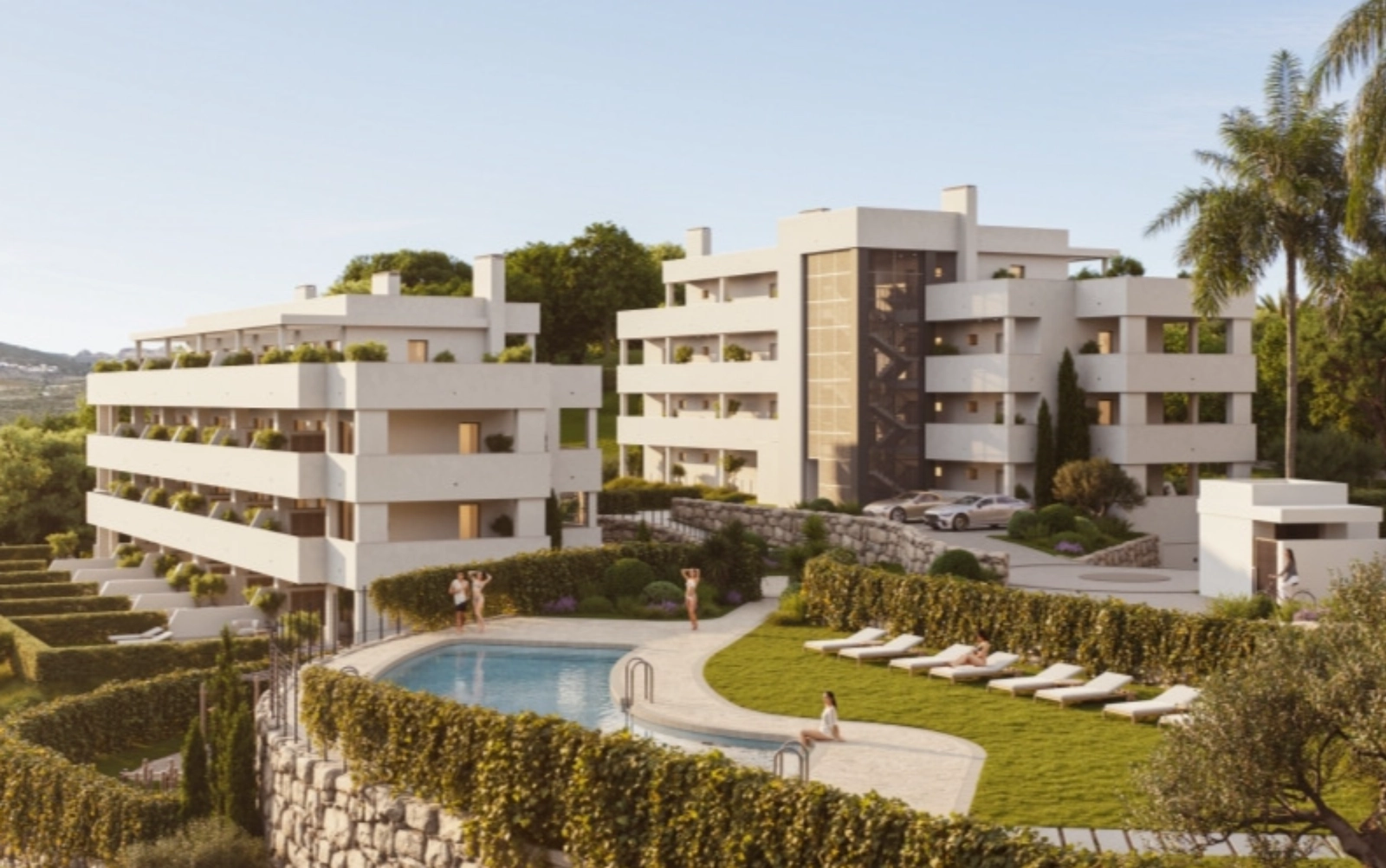 Relax by the inviting communal swimming pool, surrounded by beautiful green lawns and sunbathing areas.