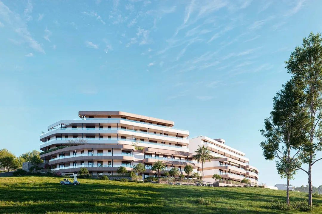 The development's contemporary architecture integrates beautifully with the green landscape of the golf course.