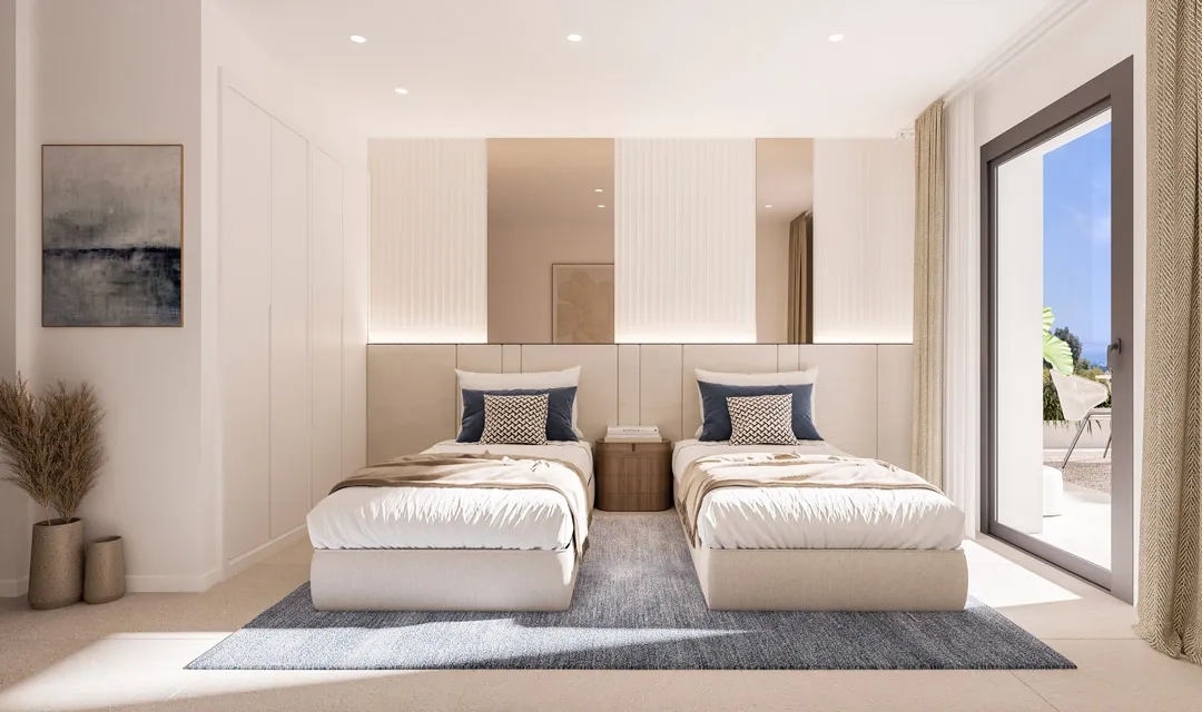 Comfortable and light-filled secondary bedrooms, designed for family or guests.