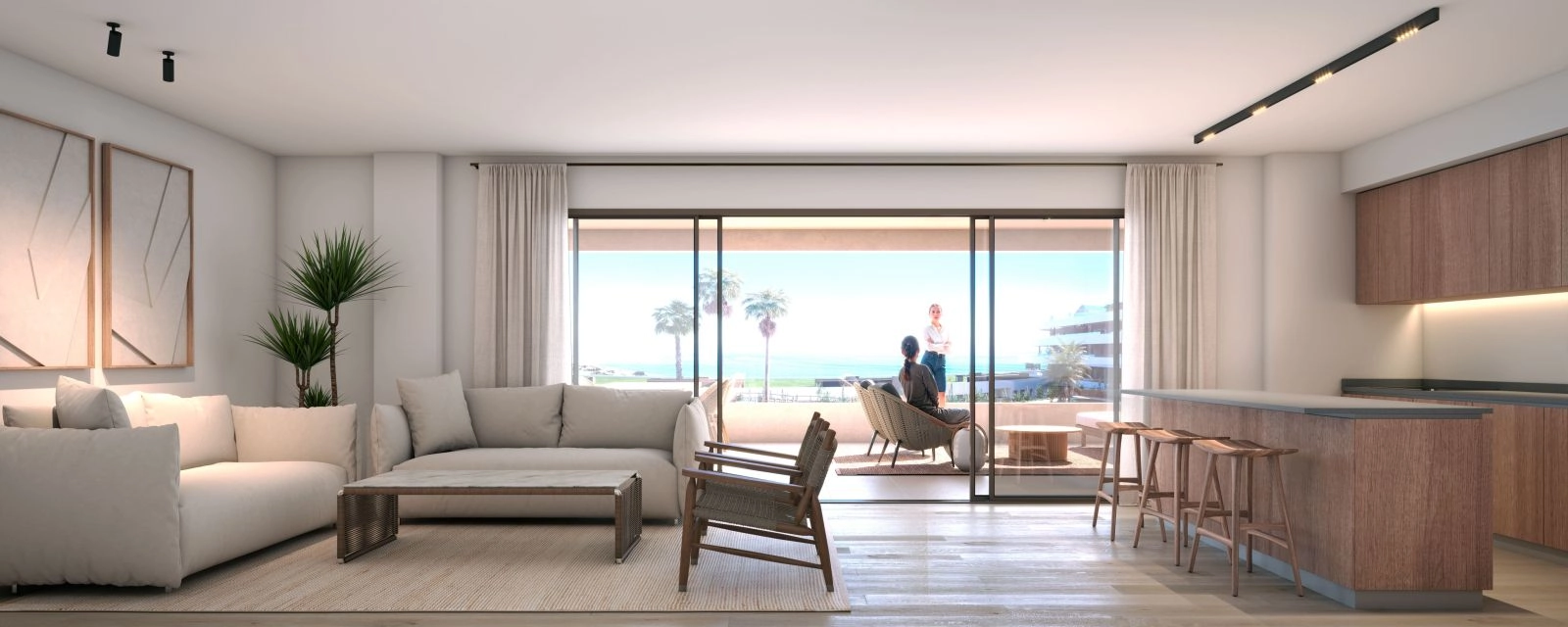 A bright and elegant living room that opens directly onto a private terrace with sea views.