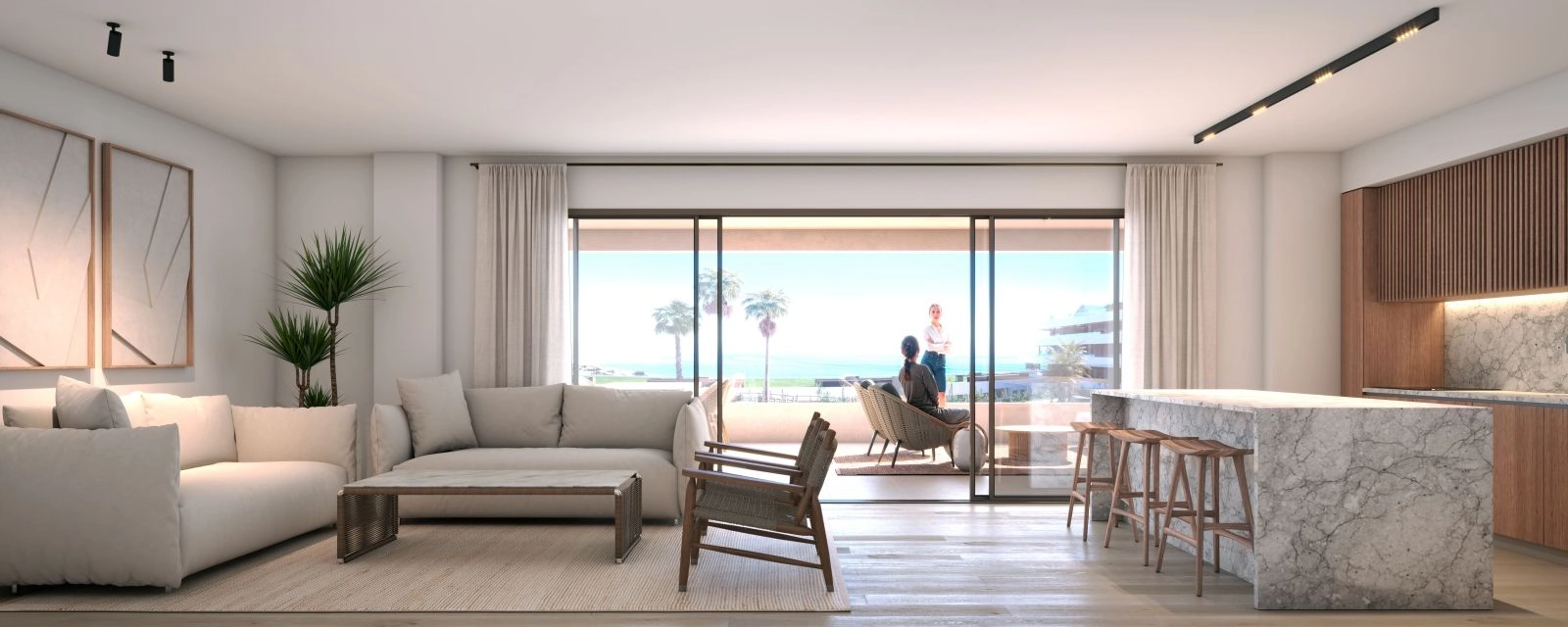 The open-plan kitchen and living area, designed for modern living and seamless indoor-outdoor flow.
