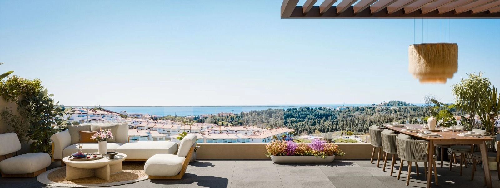Spacious terraces designed for dining and relaxing with panoramic sea views over the Costa del Sol.