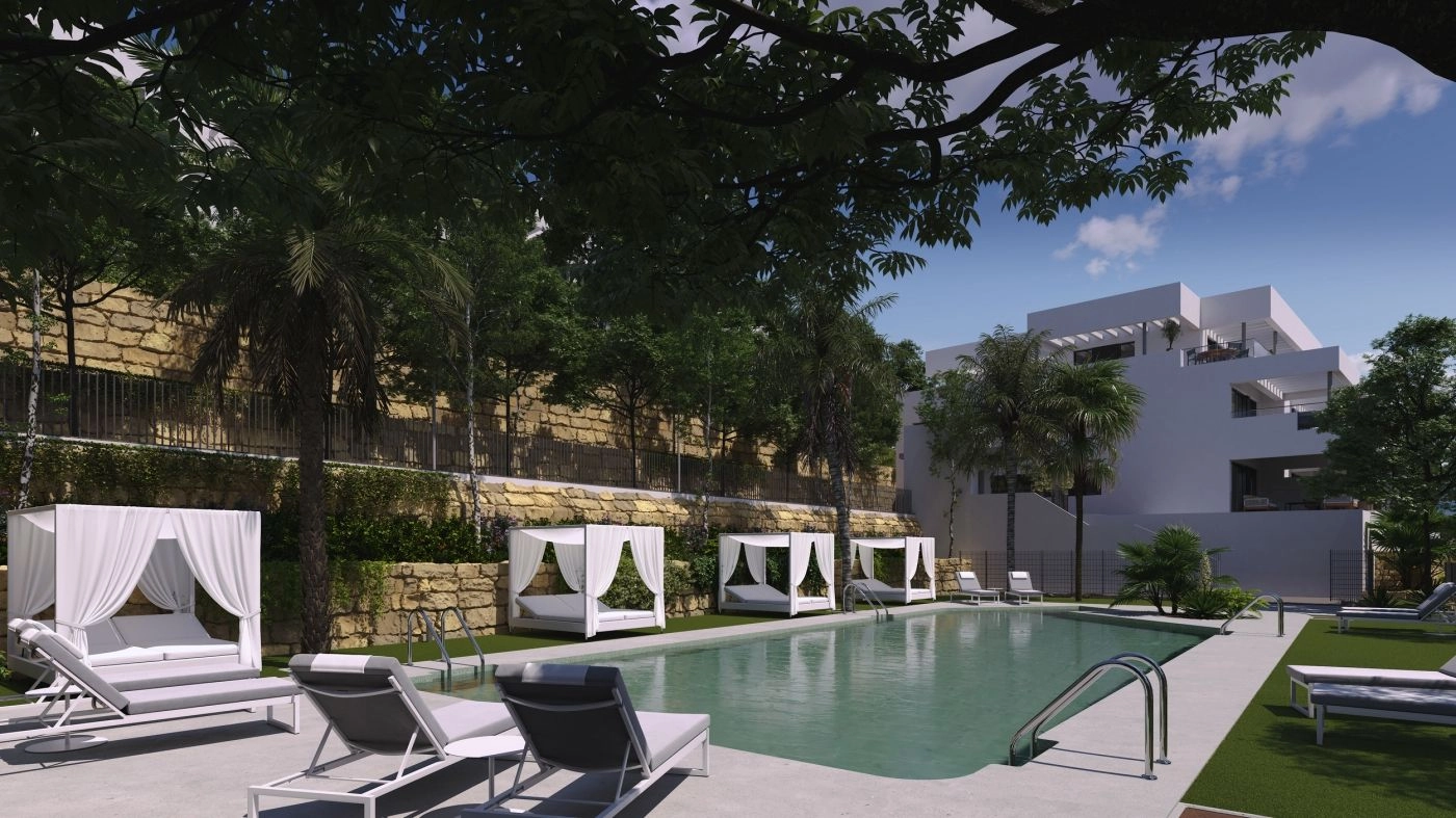 Relax and unwind by the stunning communal swimming pool, surrounded by nature.
