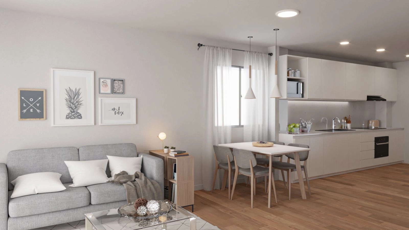 The bright and spacious living area is designed for comfort and flows seamlessly into the modern kitchen.