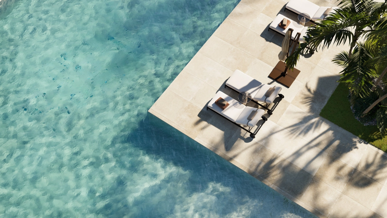 An aerial view of the crystalline waters of the communal pool, an oasis of tranquility.