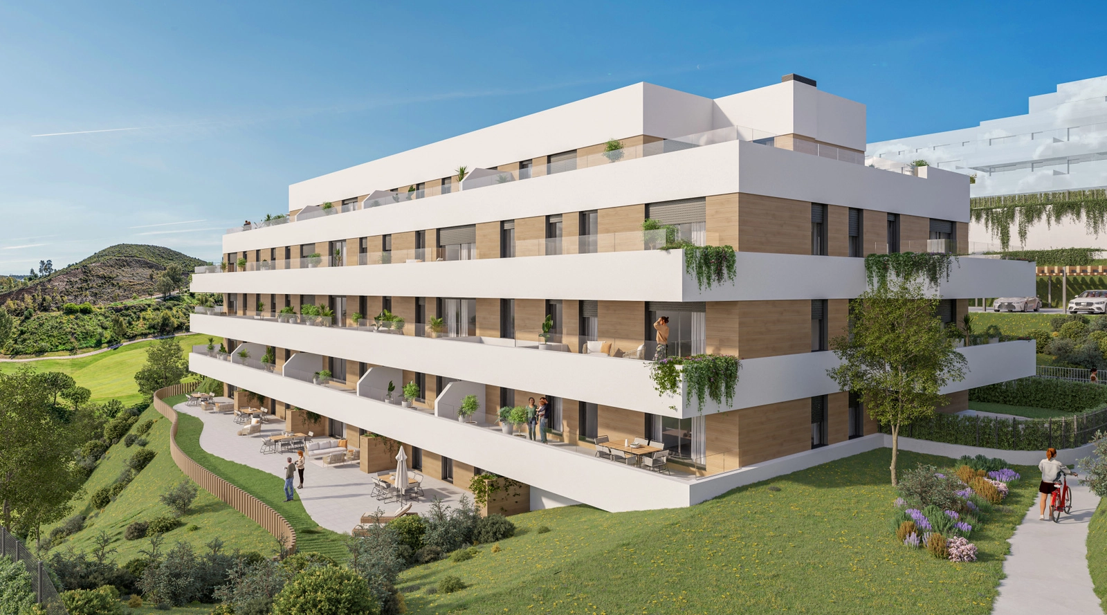 The modern architecture of the residences, overlooking the lush green landscape of the golf course.