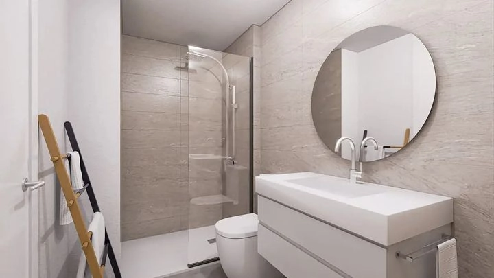 Contemporary bathrooms are finished with elegant, high-quality materials.