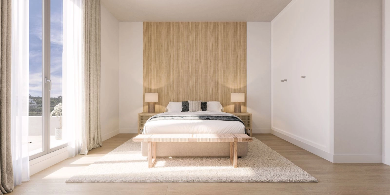 Elegantly designed bedrooms offer a tranquil space for rest and relaxation, filled with natural light.