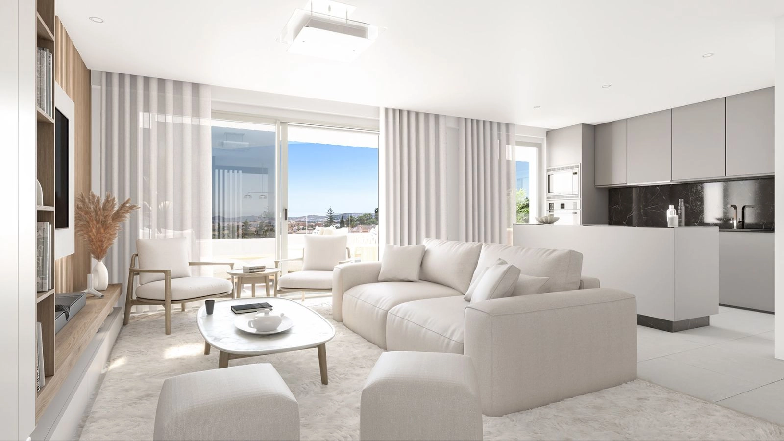A bright and spacious living area, designed with a neutral palette, flowing seamlessly towards the sunlit terrace.