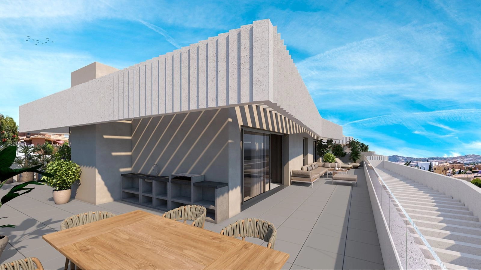 An expansive rooftop terrace, perfect for dining, entertaining, and enjoying the Costa del Sol sunshine.