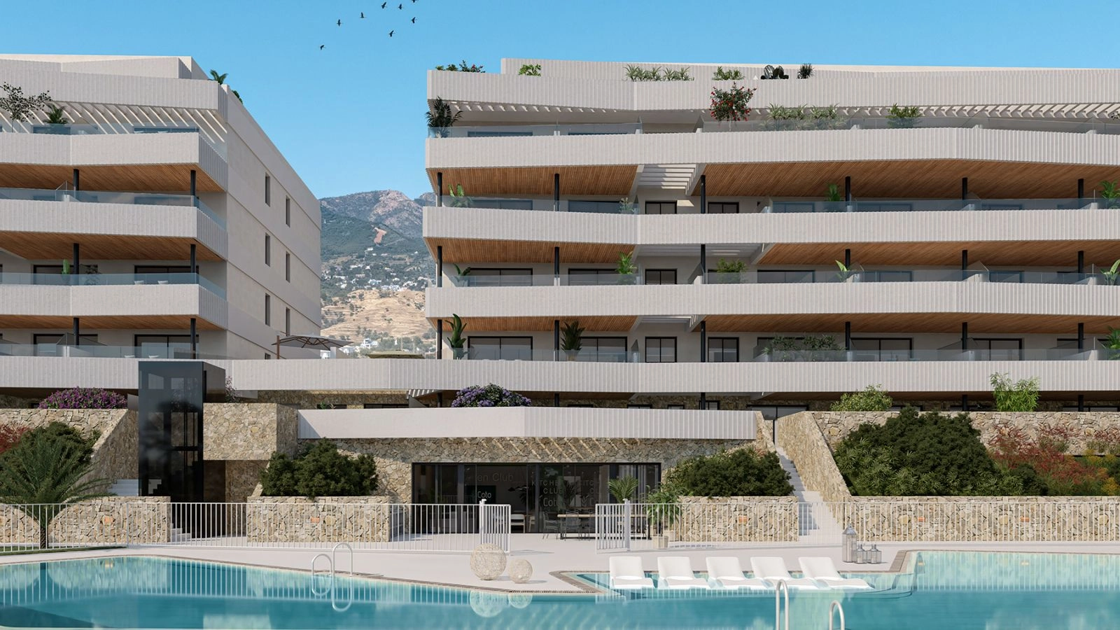 A closer look at the contemporary architectural details and the beautiful stone-clad lower levels by the pool.