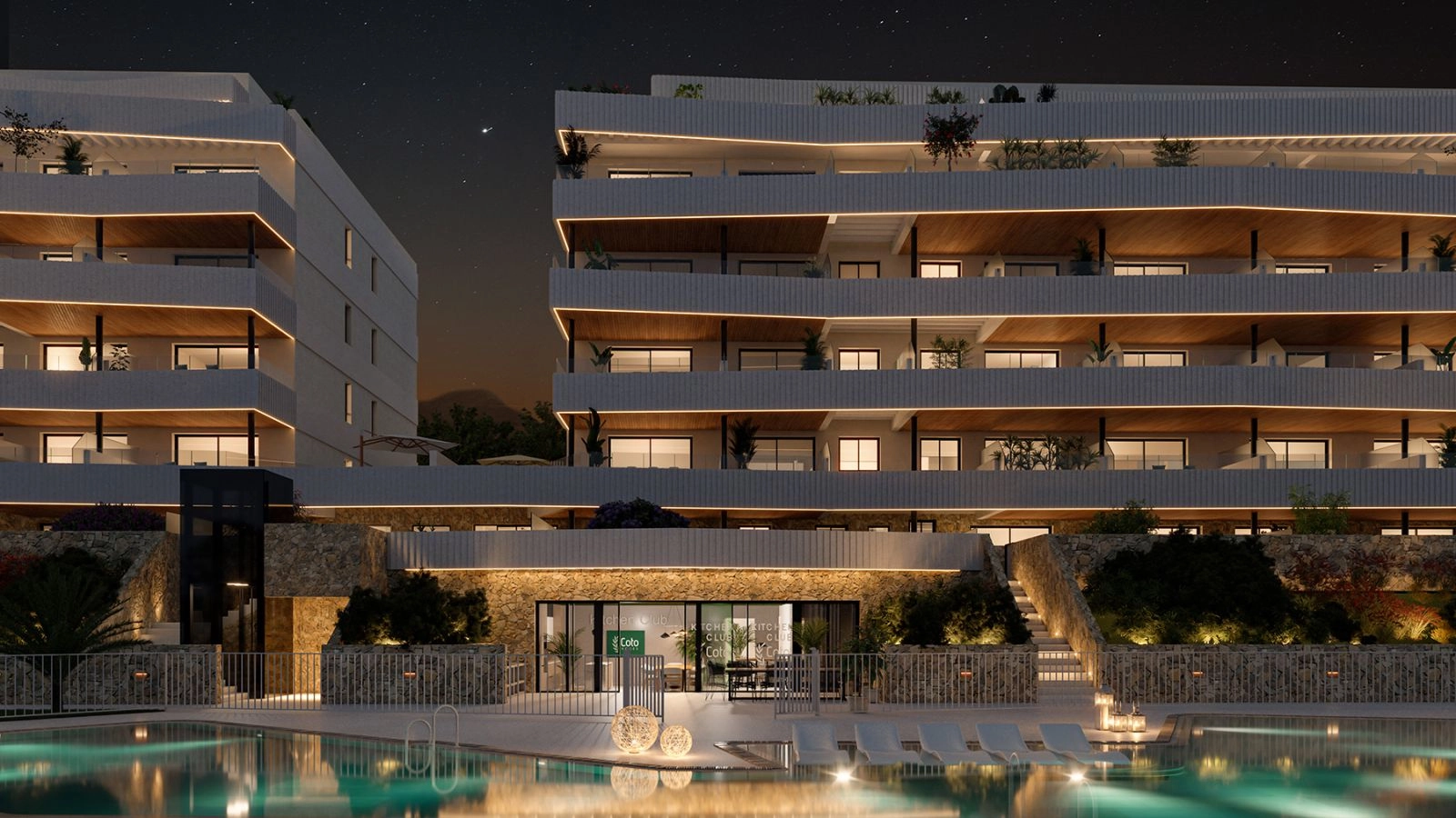 The property illuminated at night, showcasing its warm and welcoming atmosphere.