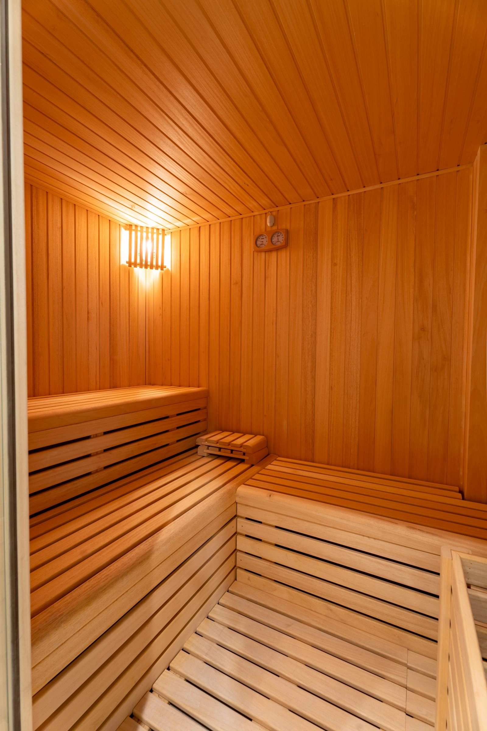 Relax and rejuvenate in the communal sauna, a perfect wellness amenity.