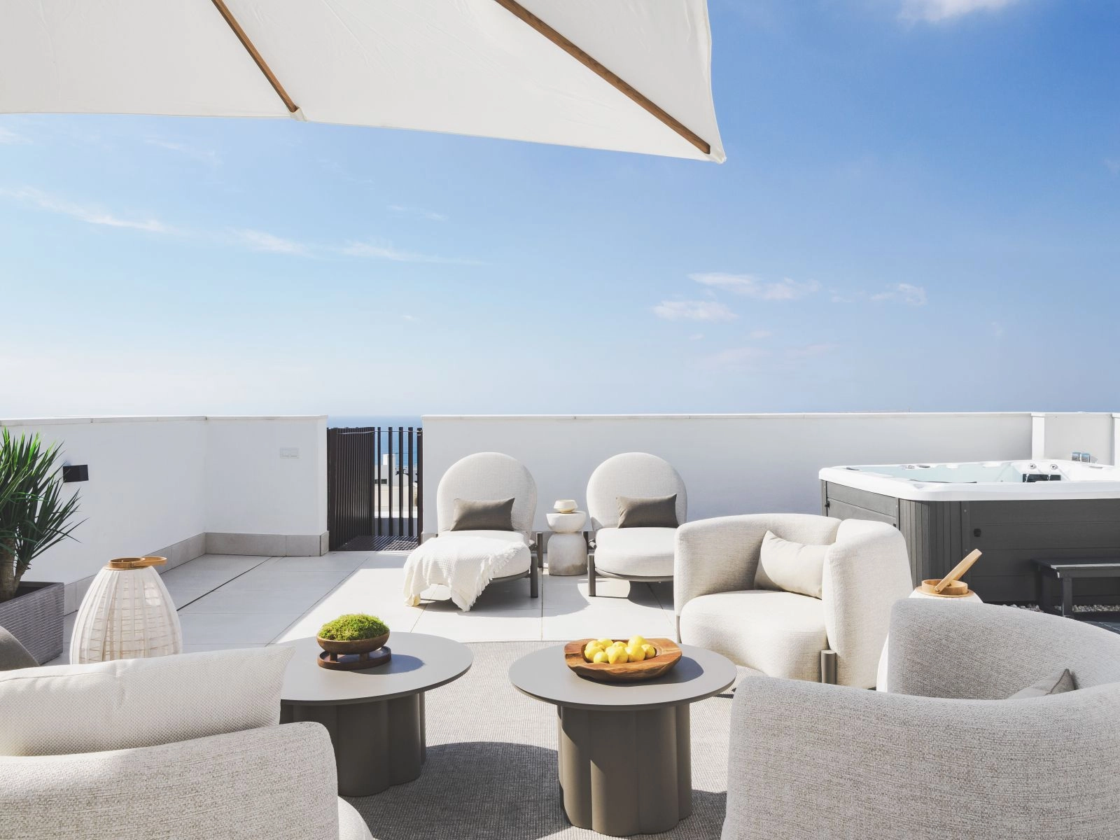 The rooftop solarium offers a private space to sunbathe and relax, with incredible views over the Costa del Sol.
