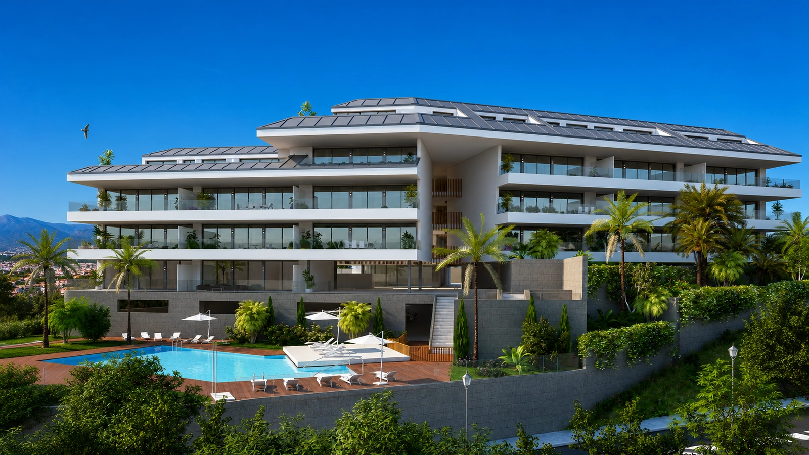 An impressive view of the development, showcasing its modern architecture and beautiful communal pool area.