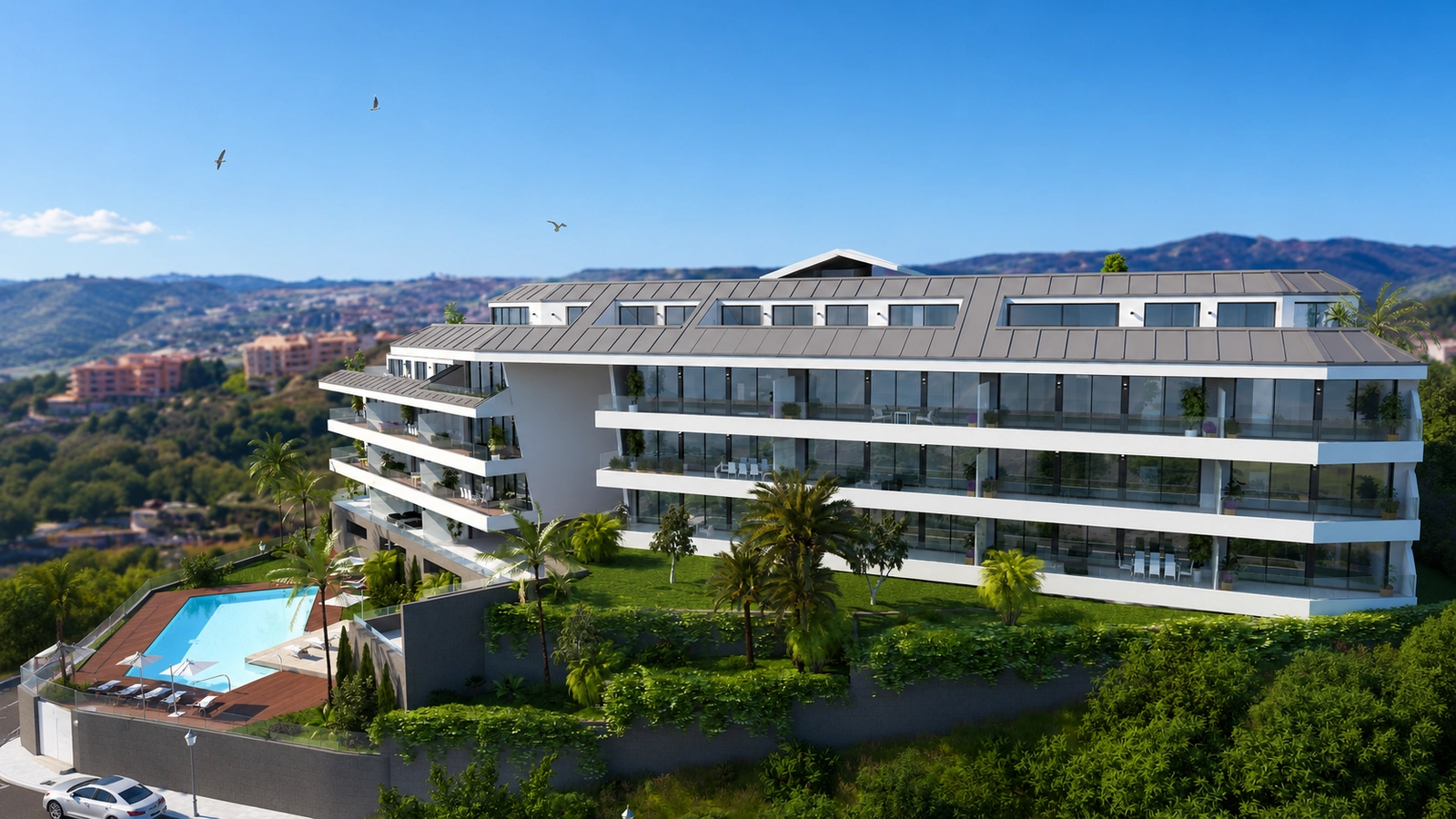The elevated position of the building ensures that residents enjoy breathtaking views over the surrounding landscape and the Mediterranean Sea.