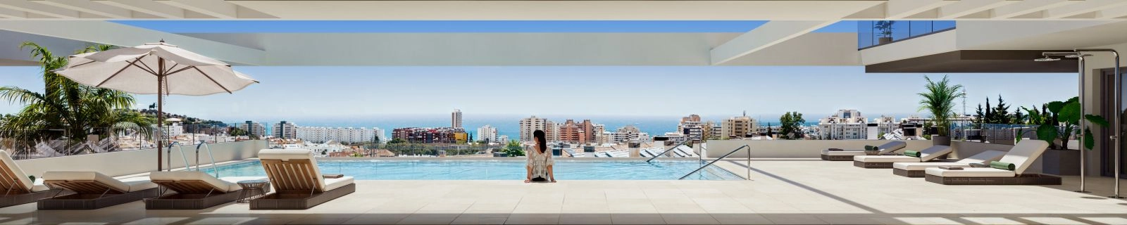 The rooftop infinity pool provides a perfect setting to relax and enjoy the panoramic sea views.