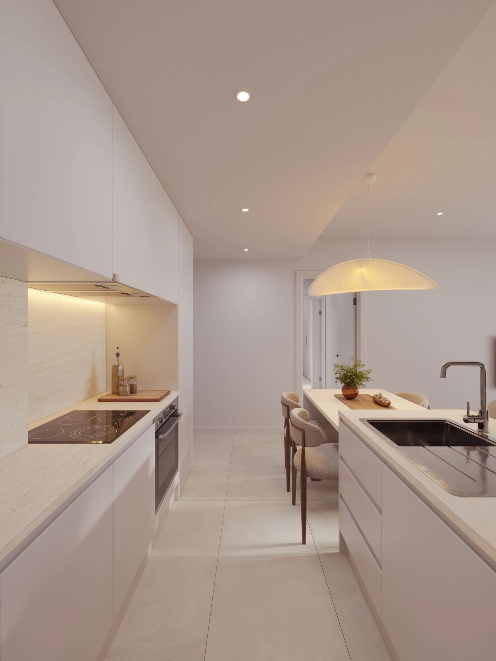 A modern, fully equipped kitchen with clean lines and high-quality finishes.